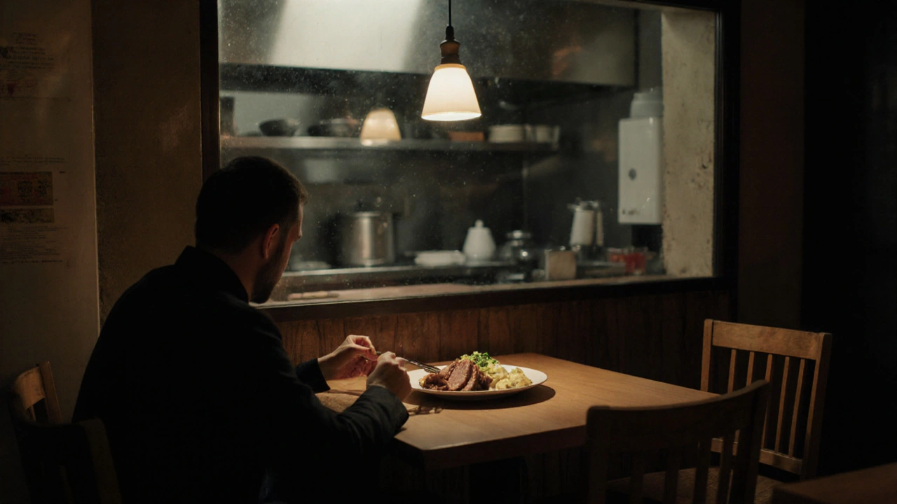 Single plate of pork roast with dumplings at U Káča in Žižkov, viewed through kitchen glass, quiet dining setting.
